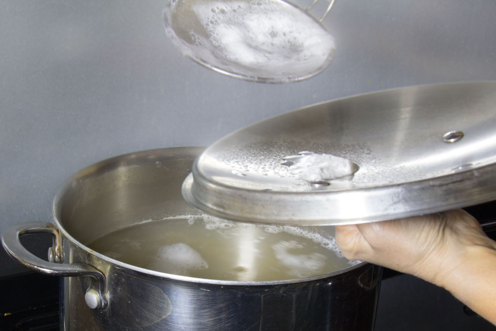 Skim the foam 3–4 times during the first 15 minutes of boiling.