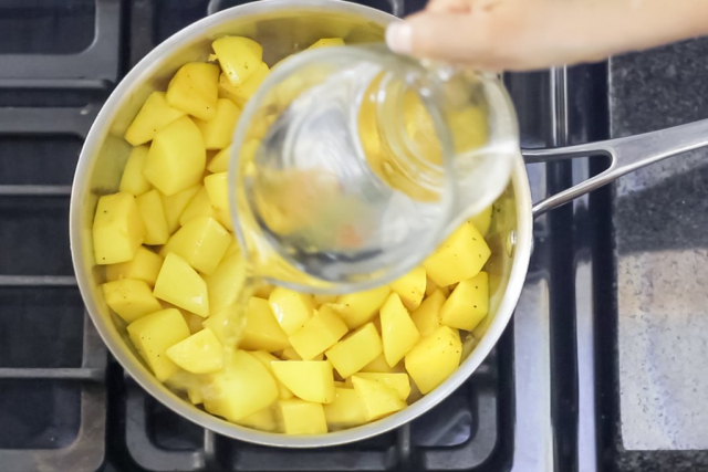 #12 Fill the pan with filtered water to cover the potatoes.