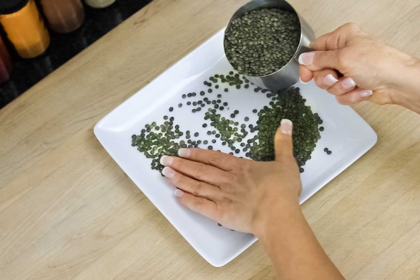 Sorting Lentils On A Square White Plate Tips The Noil Kitchen